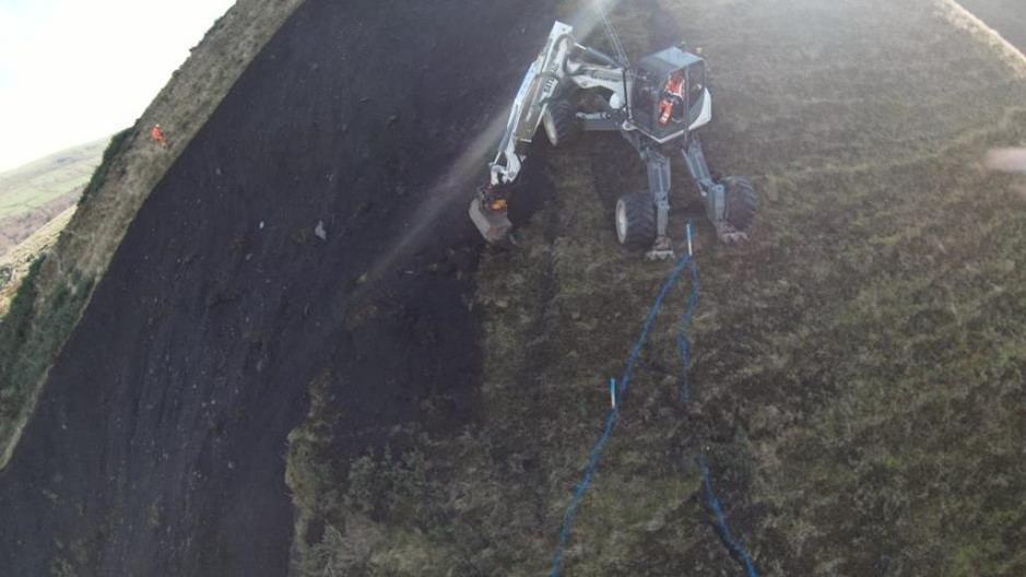 spider excavator working on a mountain